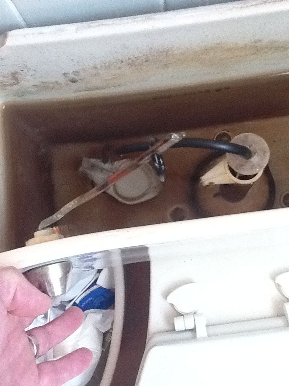 Lift the tank lid and find the problem. When you move the handle the valve in the bottom should open, releasing the water.