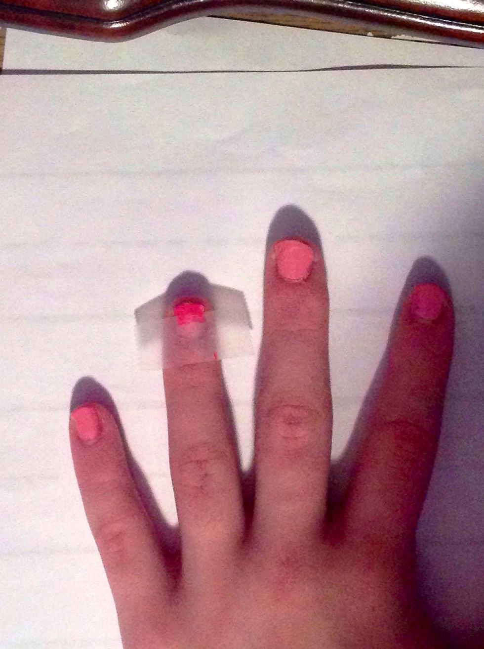 Lift the tape off your nail and repeat with the next shade.