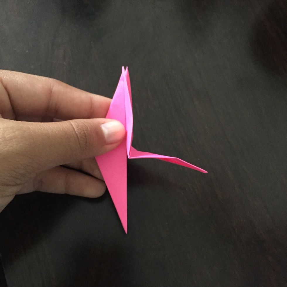 Lift up the bottom so that it is halfway to the top.