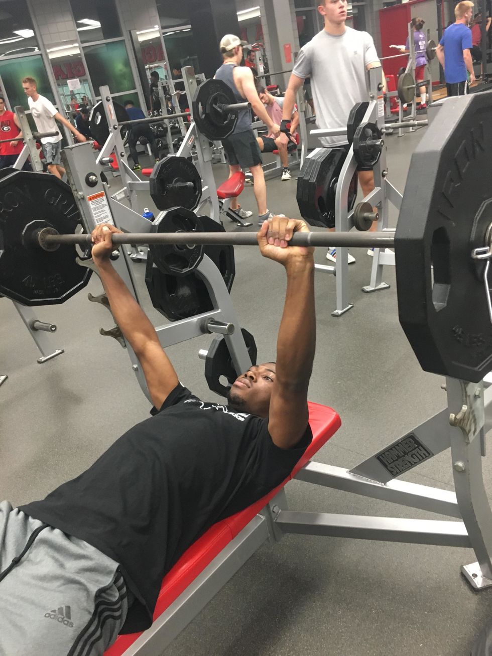 Lift weight off of bar being sure to brace your arms and back