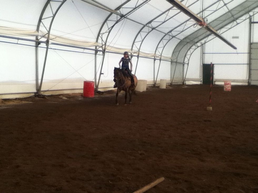 Lift your butt out of the saddle once the horse hits a trot. Make sure not to grip to tightly with your upper legs. Stand in the stirrups and use your muscles, do not use the reins for stability.