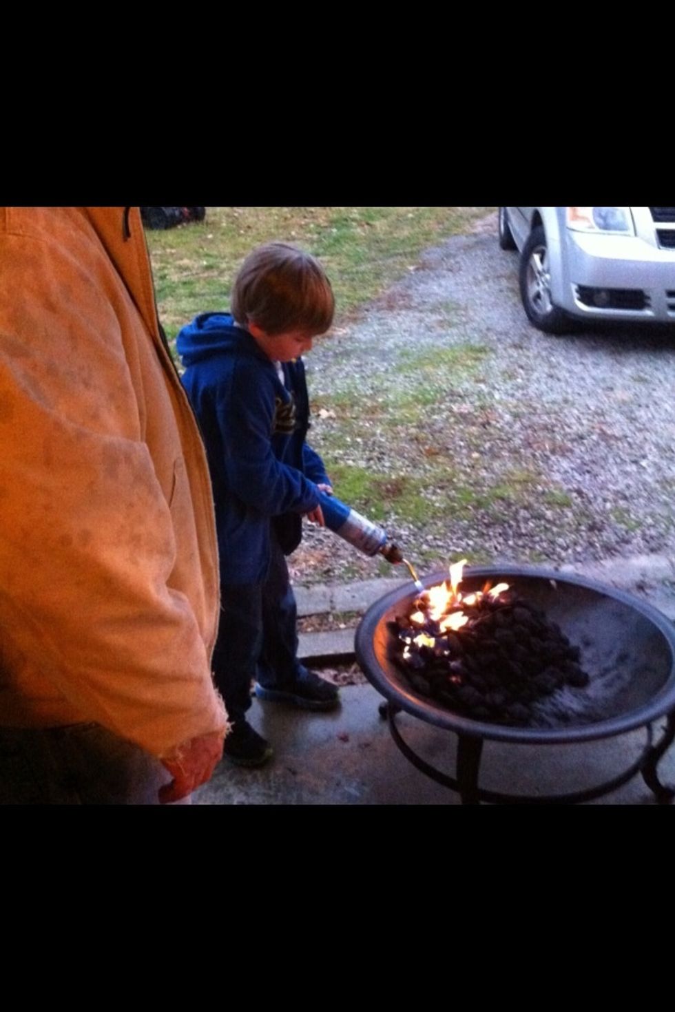 Light the charcoal to get it going while preparing.