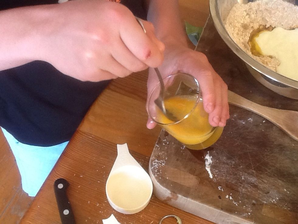 Lightly beat one egg then pour it into the bowl.
