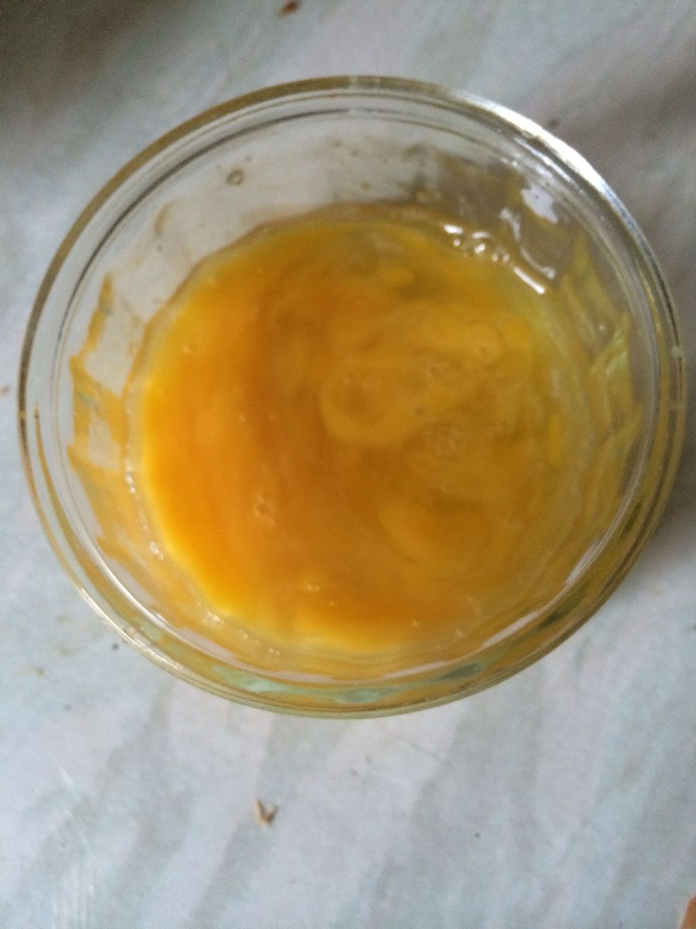 Lightly beat the egg.