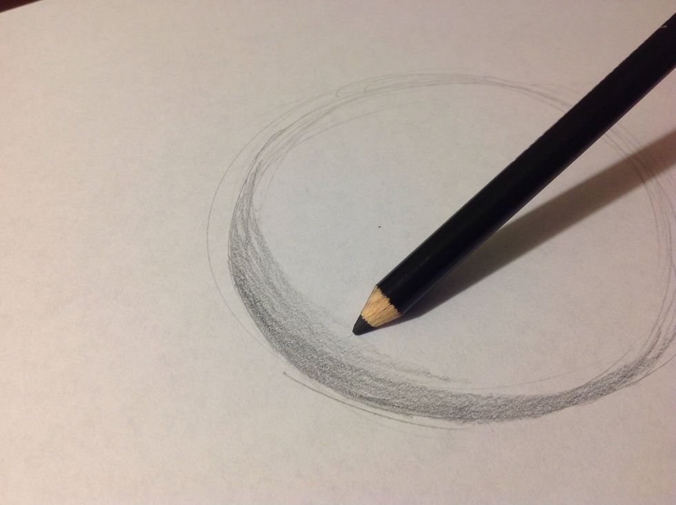 Lightly color in the base coat. Don't color the whole thing. Just the shadow part. Where that is, is opposite the direction of the light. So, if the light is in the upper right corner, it's in the