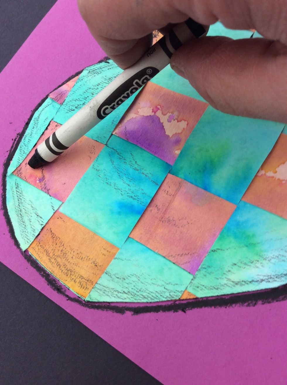 Lightly color with black crayon around edge of heart.