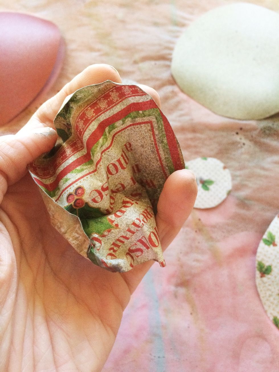 Lightly crumple each circle in your hand. This will add texture and help it stay gripping your rope. Allow to dry or use a heat gun to speed up the process.