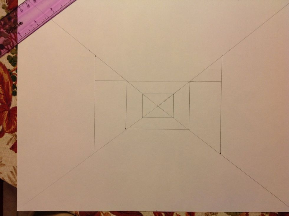 Lightly draw a horizontal line across the top of the rectangle until it meets with the vertical lines you drew in the last step.