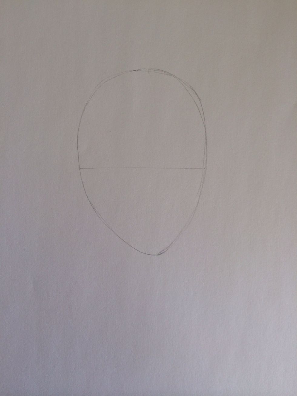 Lightly draw a horizontal line that divides the egg in half crosswise