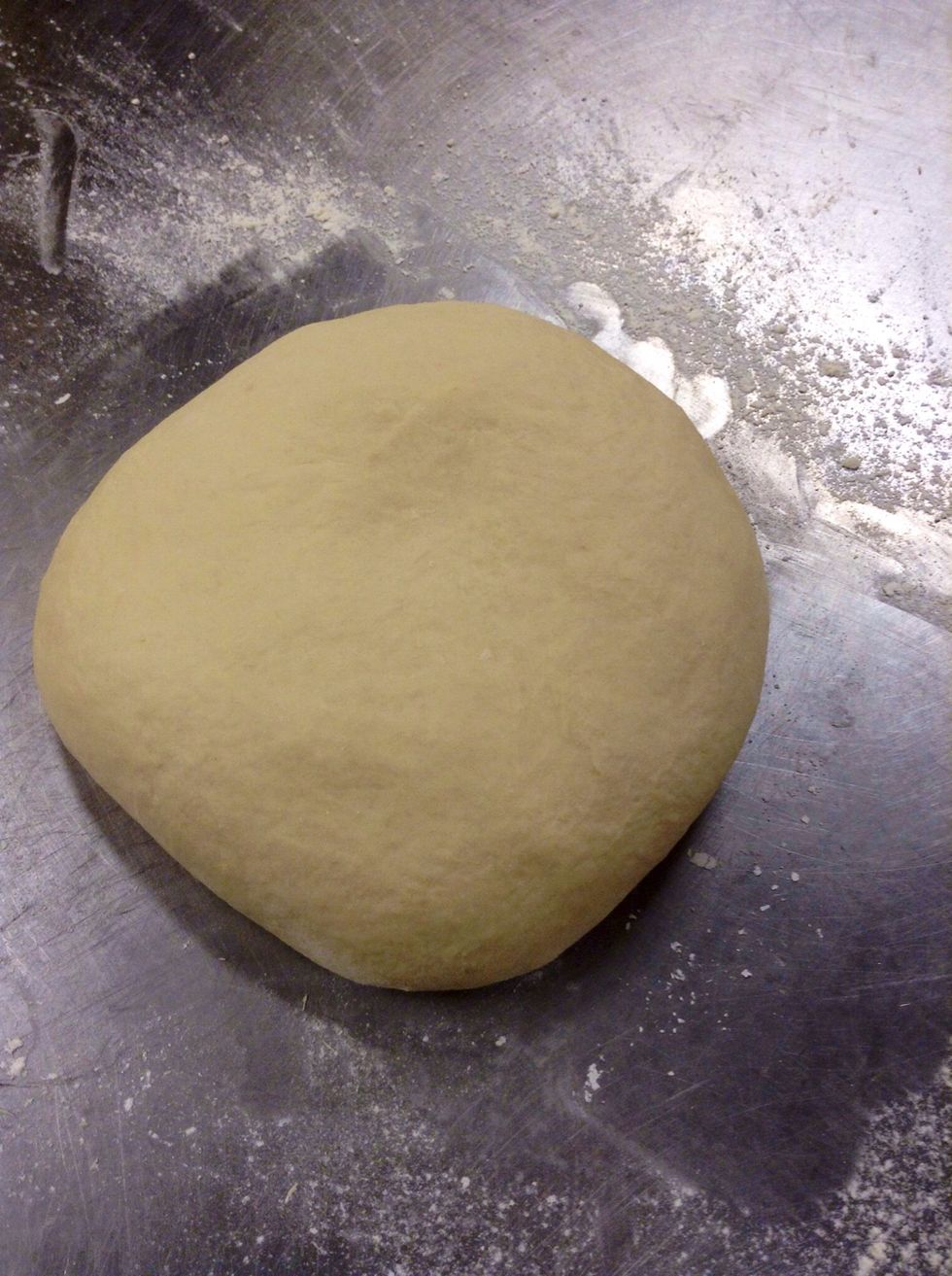Lightly flour the counter. Smooth dough out and form it into a square-ish shape.