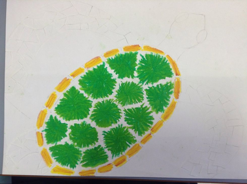 Lightly go over the yellow with the brown pastel.