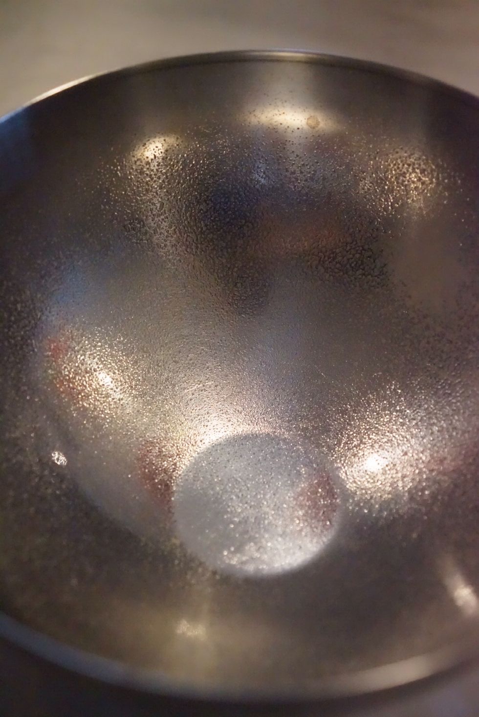 Lightly grease a large bowl.