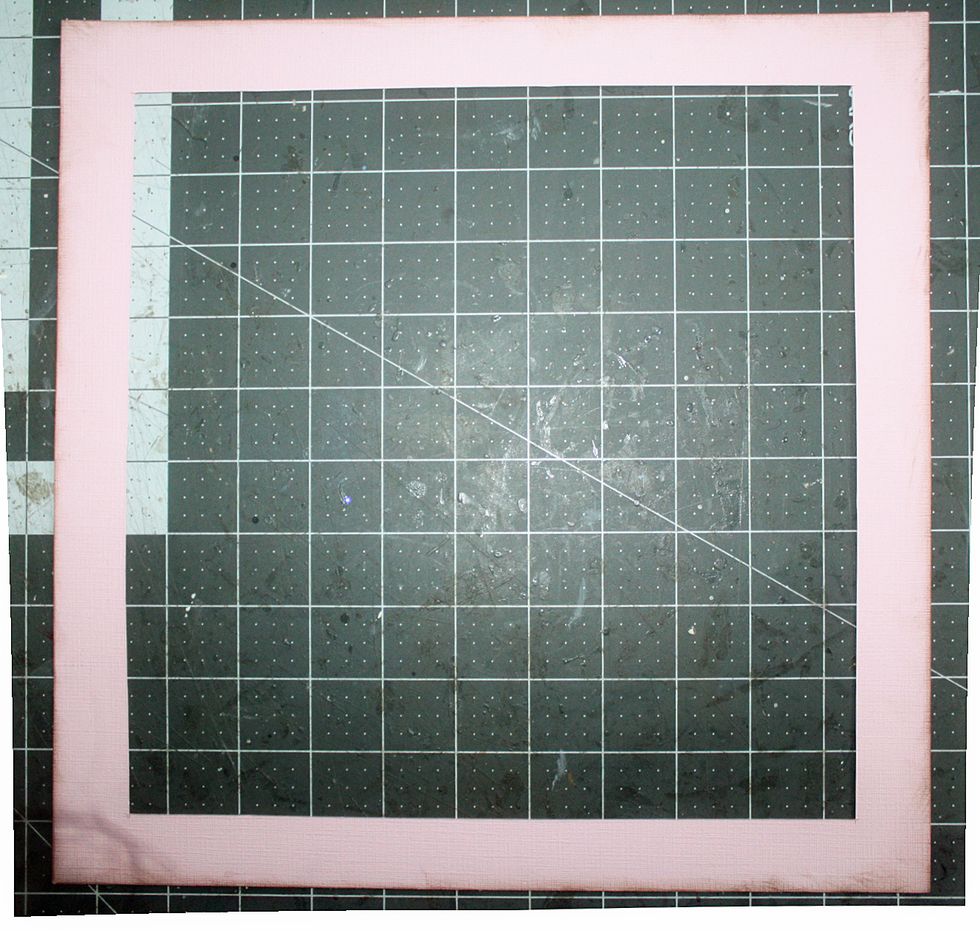 Lightly ink your cardstock and cut out a 11x11 square from center