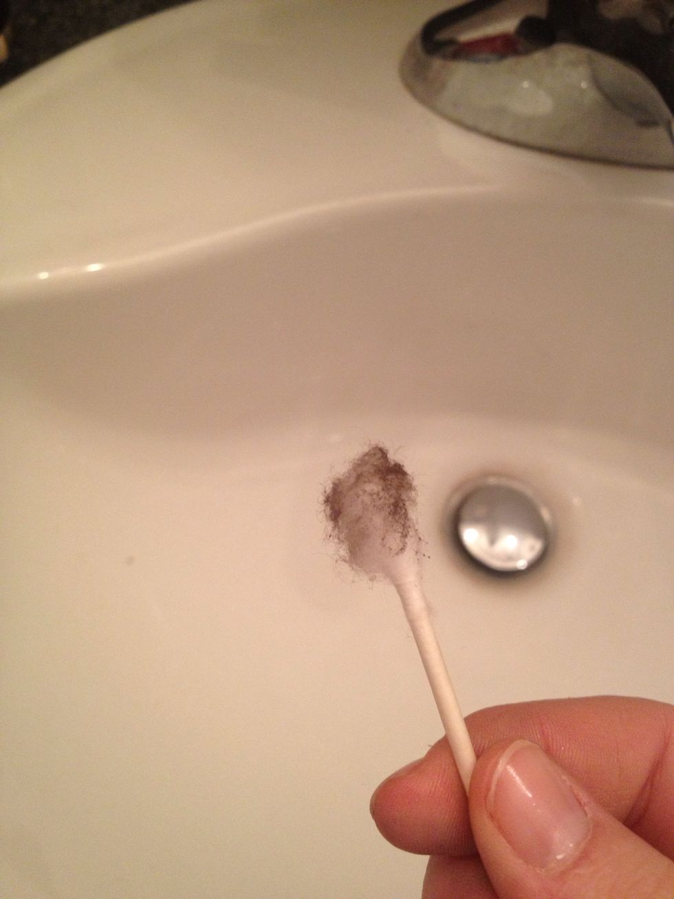 Lightly roll it around in the dark color you initially used (or if going natural just use a neutral color)