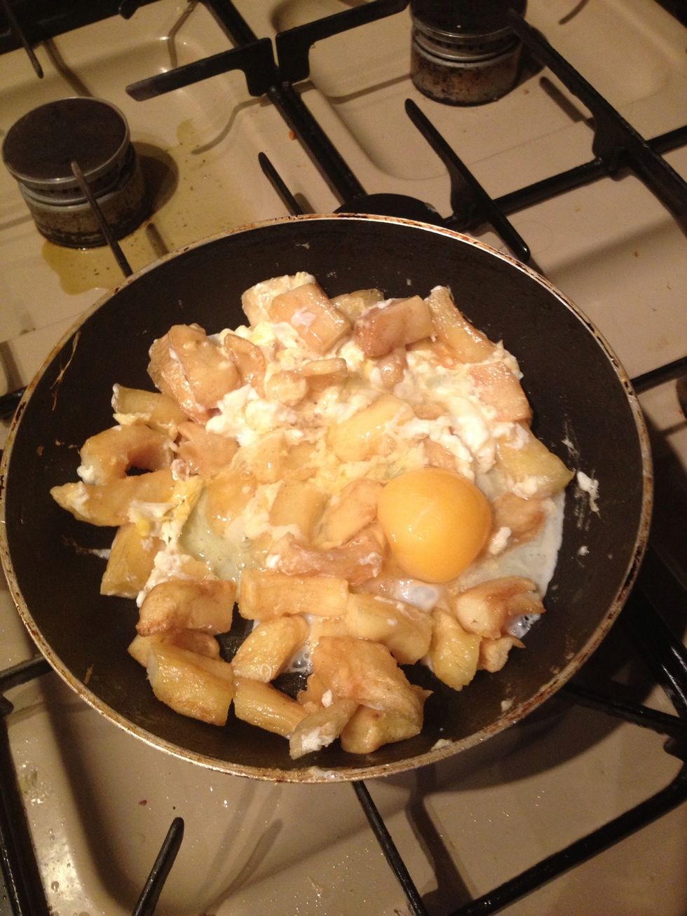 Lightly salt and crack in your eggs. (Number of eggs needed depends on the quantity of chips. I do an egg to start with & add 1 egg for each person eating. I.e 1 person= 2 eggs, 2 people= 3eggs etc)