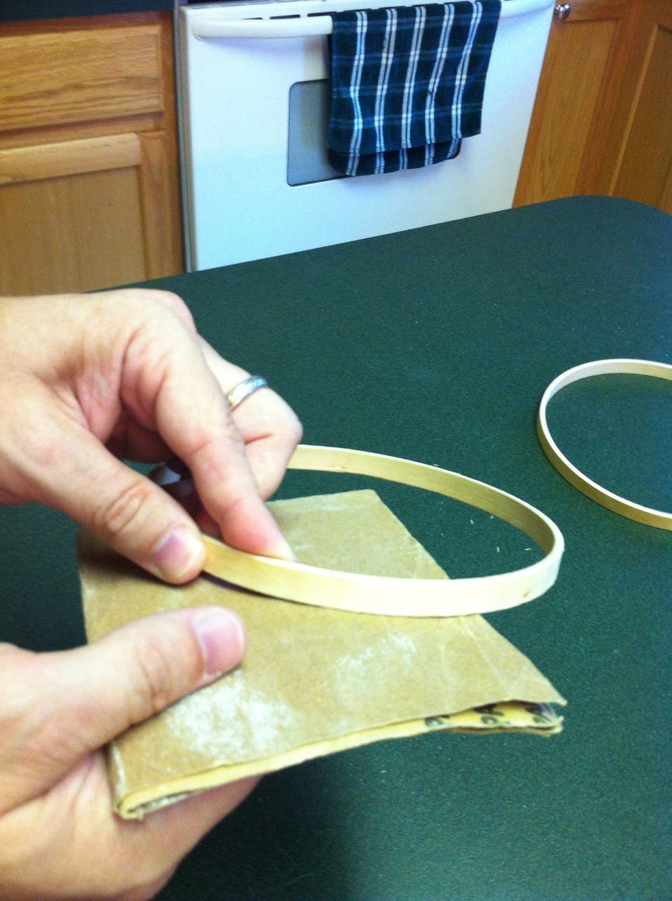 Lightly sand the embroidery hoop to remove any splinters and jagged edges.