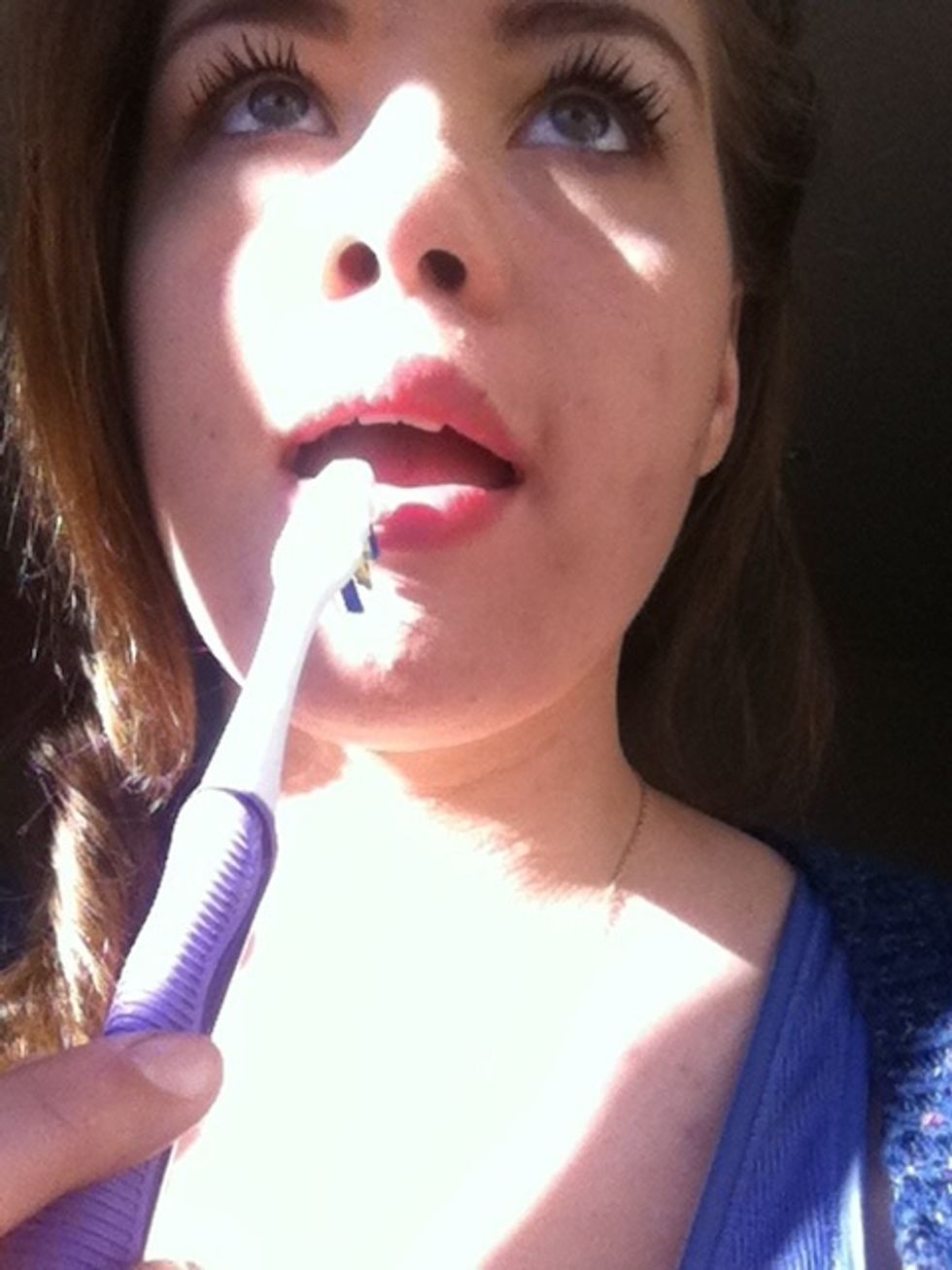 Lightly scrub the tooth brush across your lips, ( make sure to wet the tooth brush slightly), don't over scrub though, I stop when my lips start to tingle!