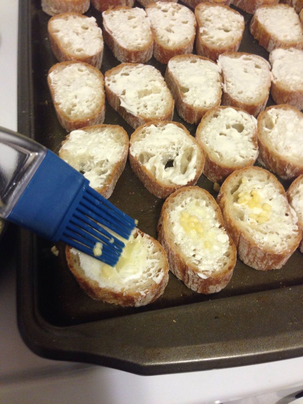 Lightly spread the melted butter/ minded garlic combo on top of he cream cheese.
