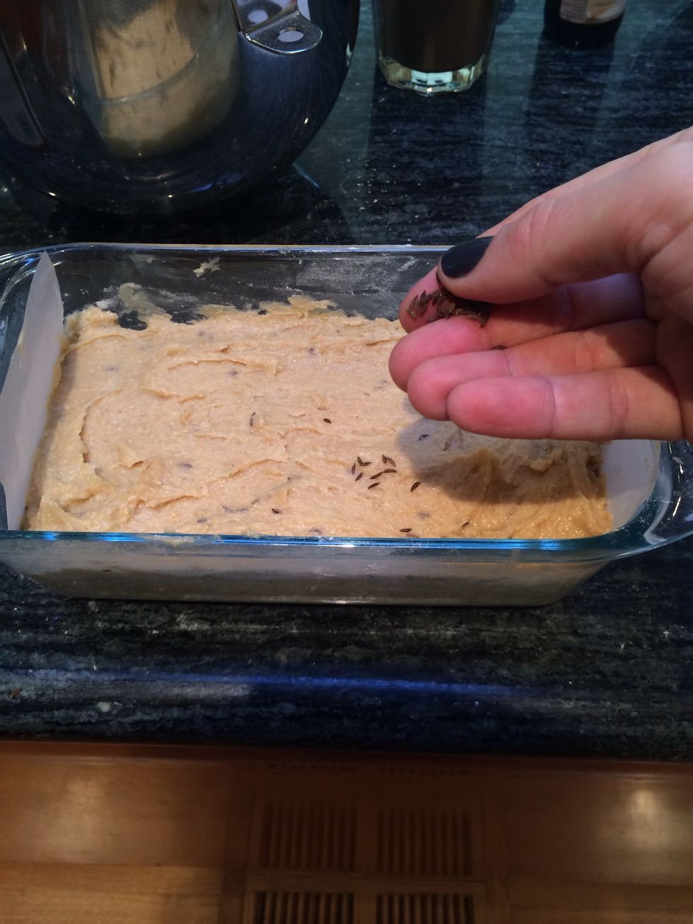 Lightly sprinkle a pinch of caraway seeds on top.