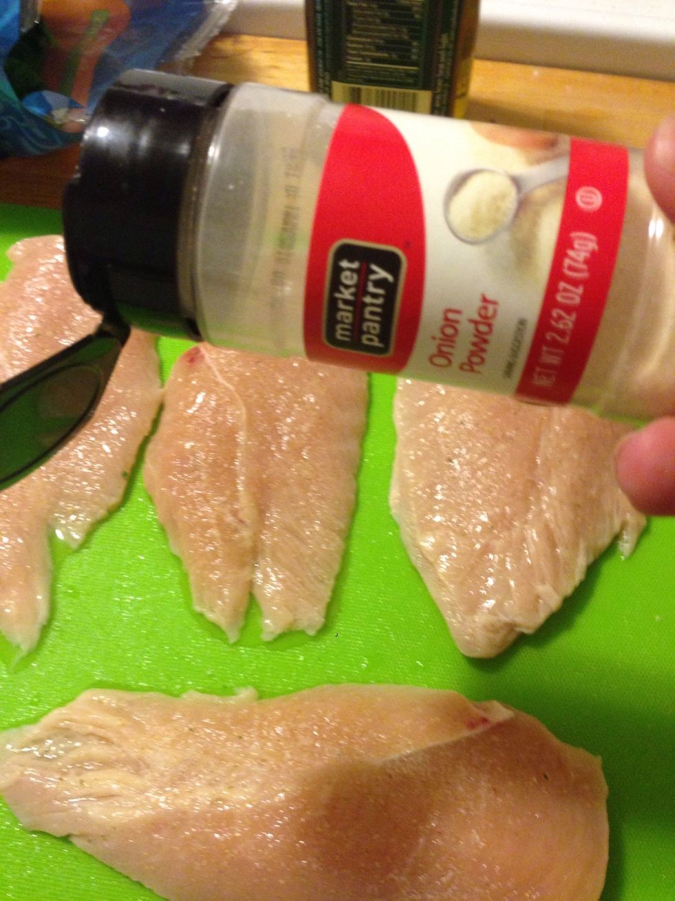 Lightly sprinkle onion powder on the chicken. I used about 1/2-1 tsp of onion powder.