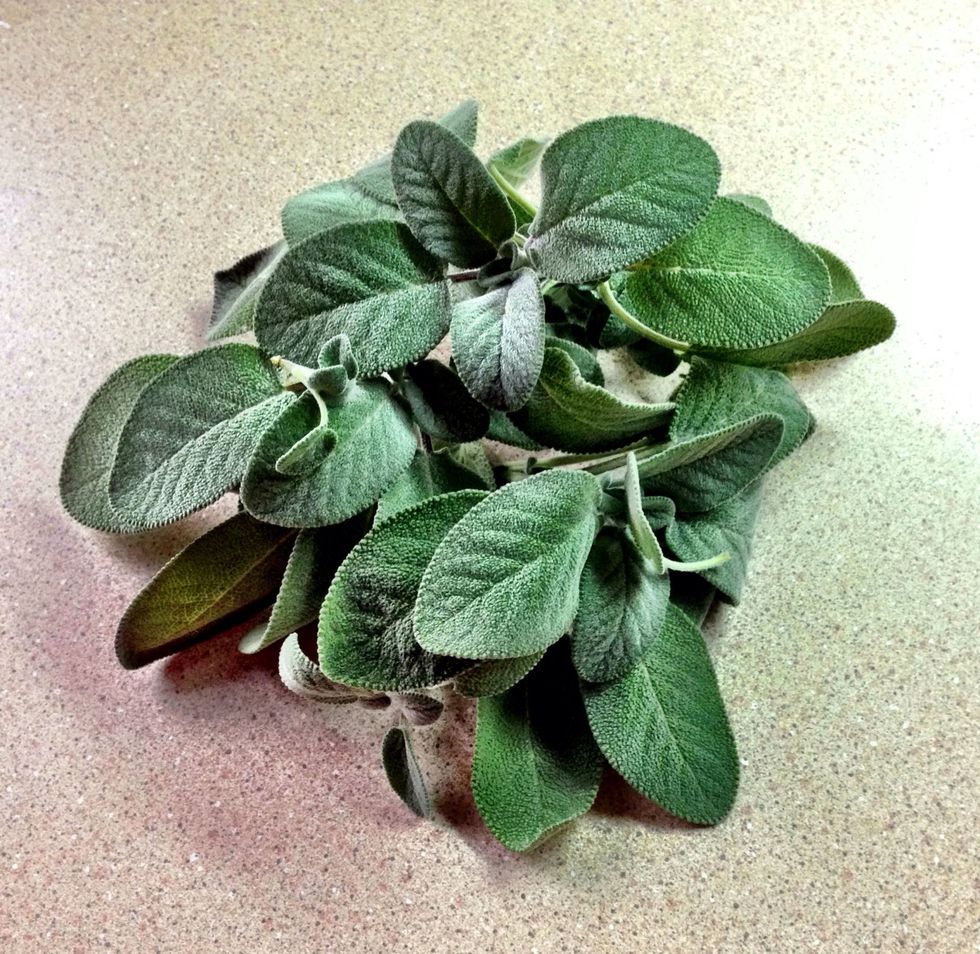 Lightly stuff the turkey with fresh sage. Make sure to scrunch up the sage so it releases its wonderful flavour.