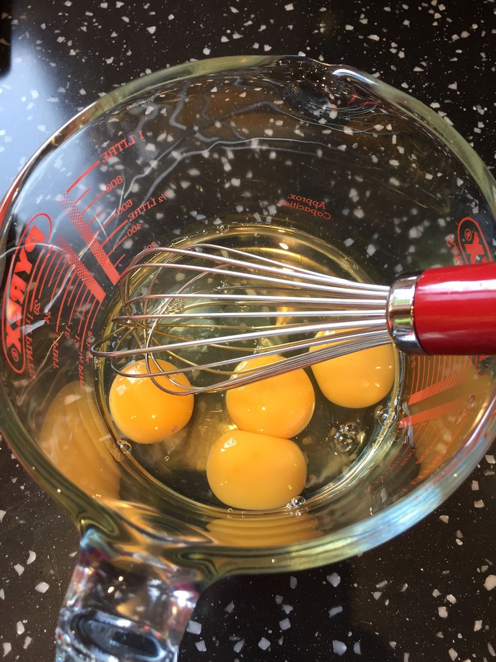 Lightly whisk the eggs and egg yolk