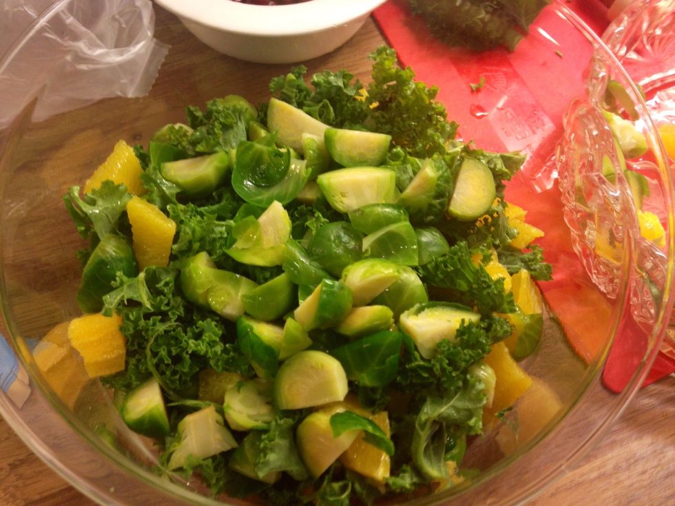 Like so..broussel sprouts, kale and orange pieces mixed together. Now add the pomegranate seeds.