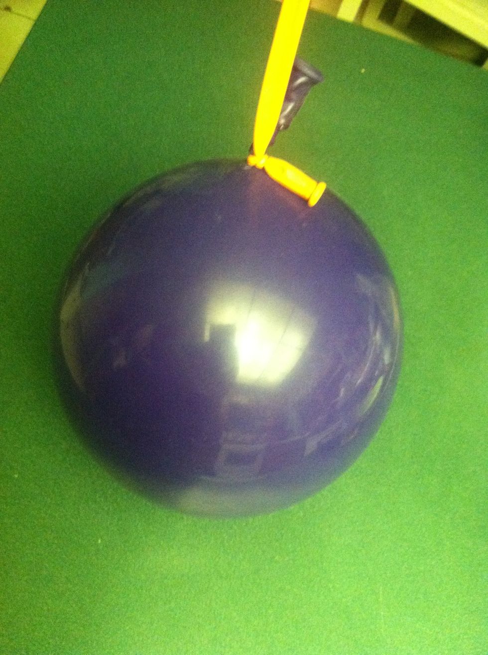 Like so...don't worry, the double stuffing, and under inflation will protect the balloon from accidental popping... Now if it meets with a child and a pair of scissors... All bets are off ;-)