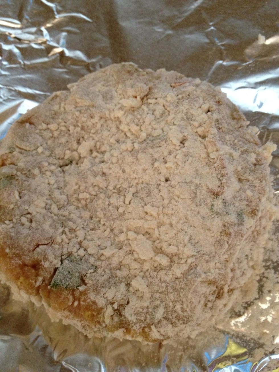 Like so.... It will be easy to this once the ball is on the dry ingredients make sure all the sides of the burger is fully covered with bread crumbs and all purpose flour