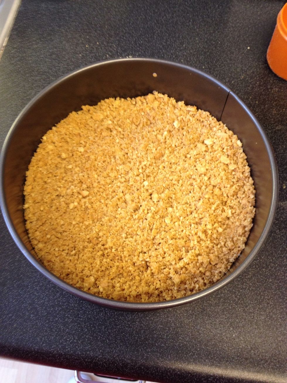 Like so... Now press the crust down in the bottom of the pan and about halfway up on the sides. Wax paper didn't work so well for me so I just used my fingers.