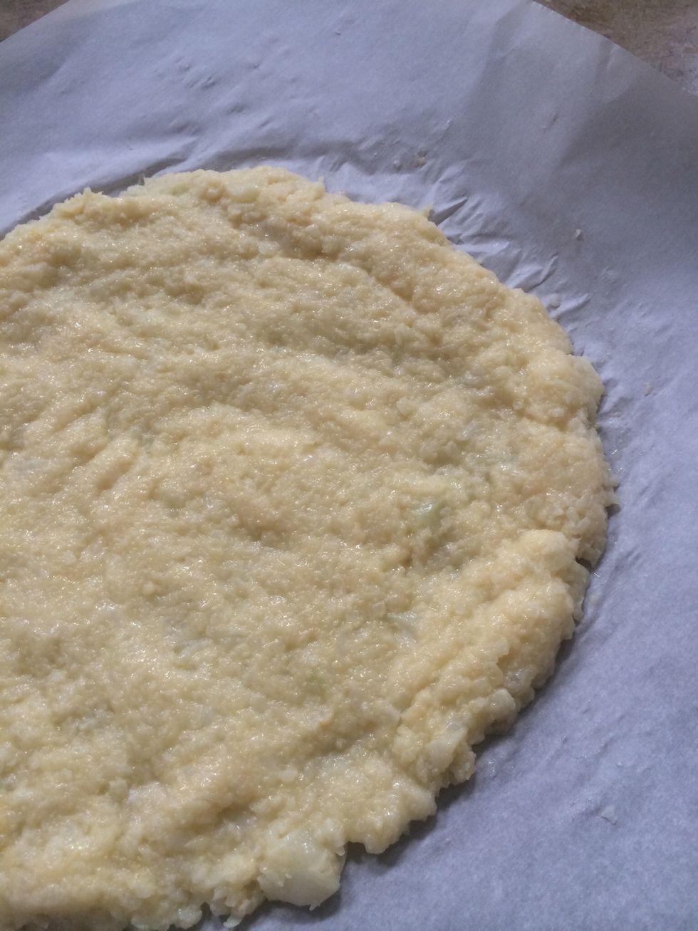 Like so. Try to make as even as possible so the pizza doesn't break once cooked.