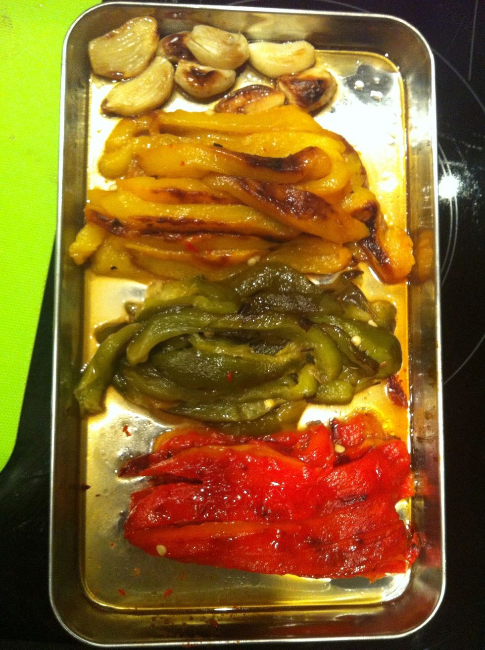 Like so..u can see roasting capsicum liquid on the tray don't throw them Away add it to ur salad dressing