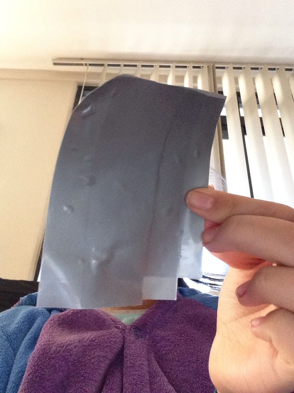 like this and stick on only the edges to the wallet