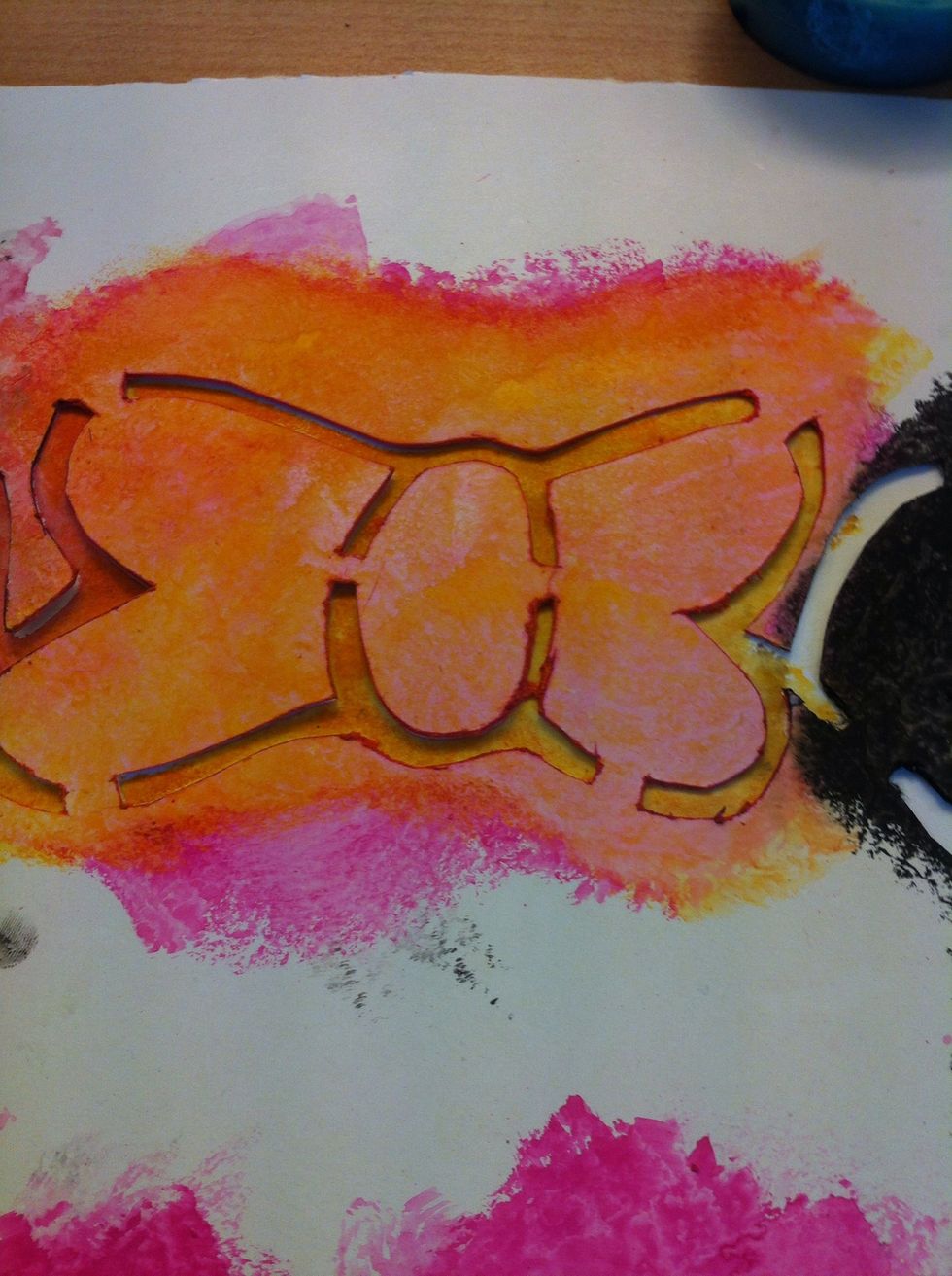 Like this, dab yellow paint onto the orange to blend it together about halfway of the bow, or when you want to change color