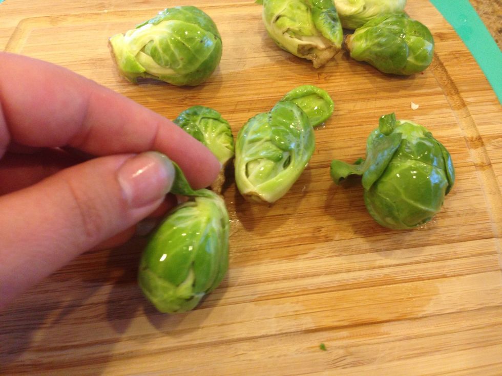 Like this....do this to all of the Brussels spouts and replace the old water in the bowl with fresh clean water. Discard anything you pulled off the Brussels sprouts.