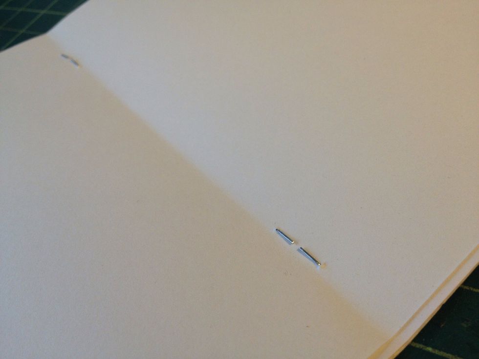 Like this! I made two of these small booklets for each passport to have lots of pages.