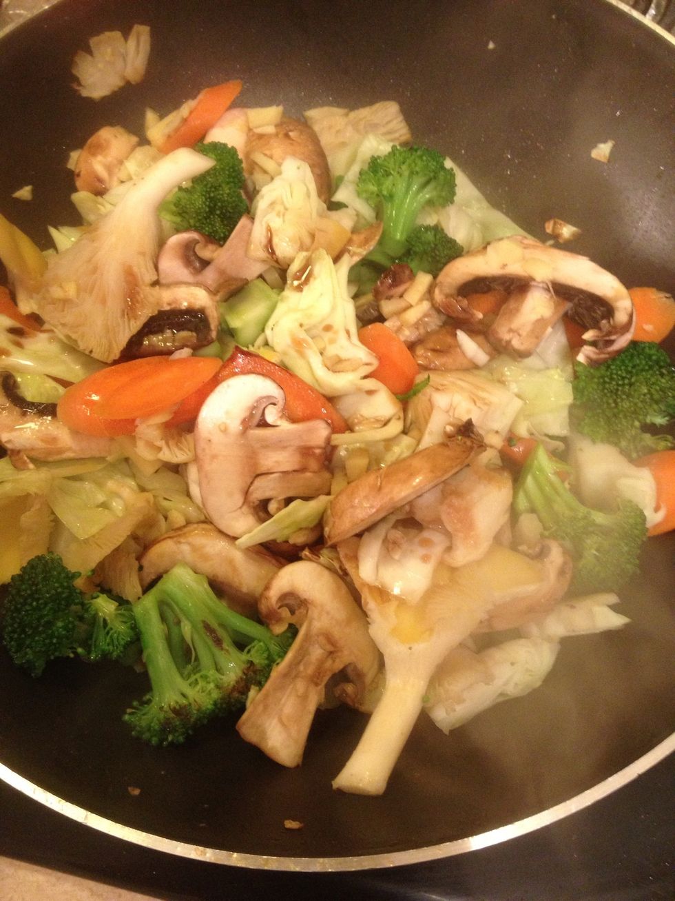 Like this. Keep stirring. The heat and shape of the wok will perfectly fry and steam as you constantly stir it around. It cooks fast because everything stays slightly crisp.