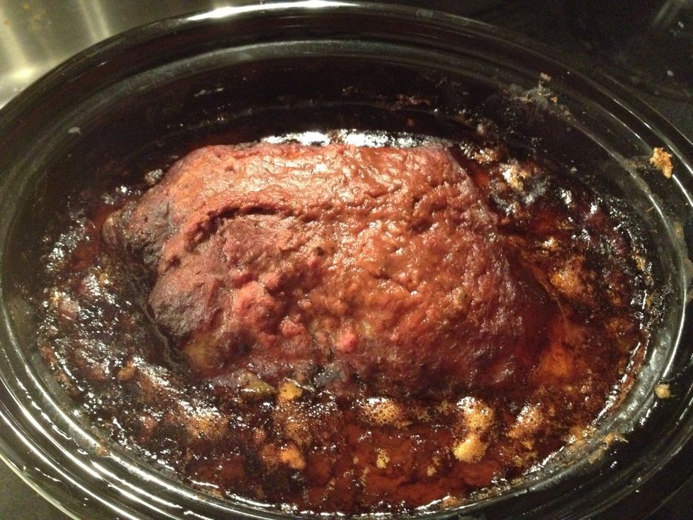 Like this. Let it cool until you can handle it. I put it in the fridge for the night, then skimmed off the congealed fat (to pretend I'm being healthy). Then use two forks to shred it.