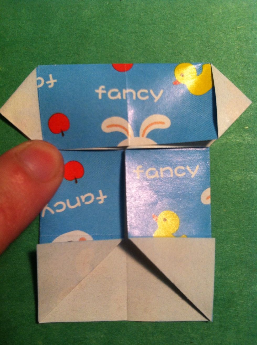 Like this. Notice how the the sides squashed out to make the little white triangles.