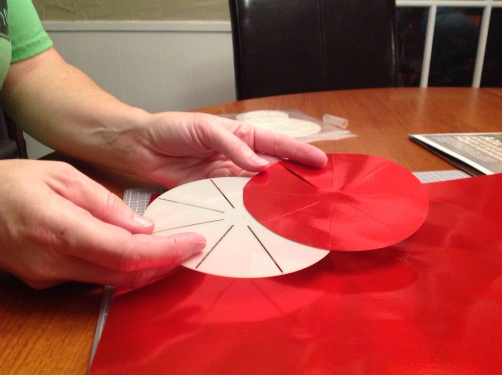 Like this. Now cut out a lot of these! We needed 2 of each of 3 sizes. So 6 rounds for each star.