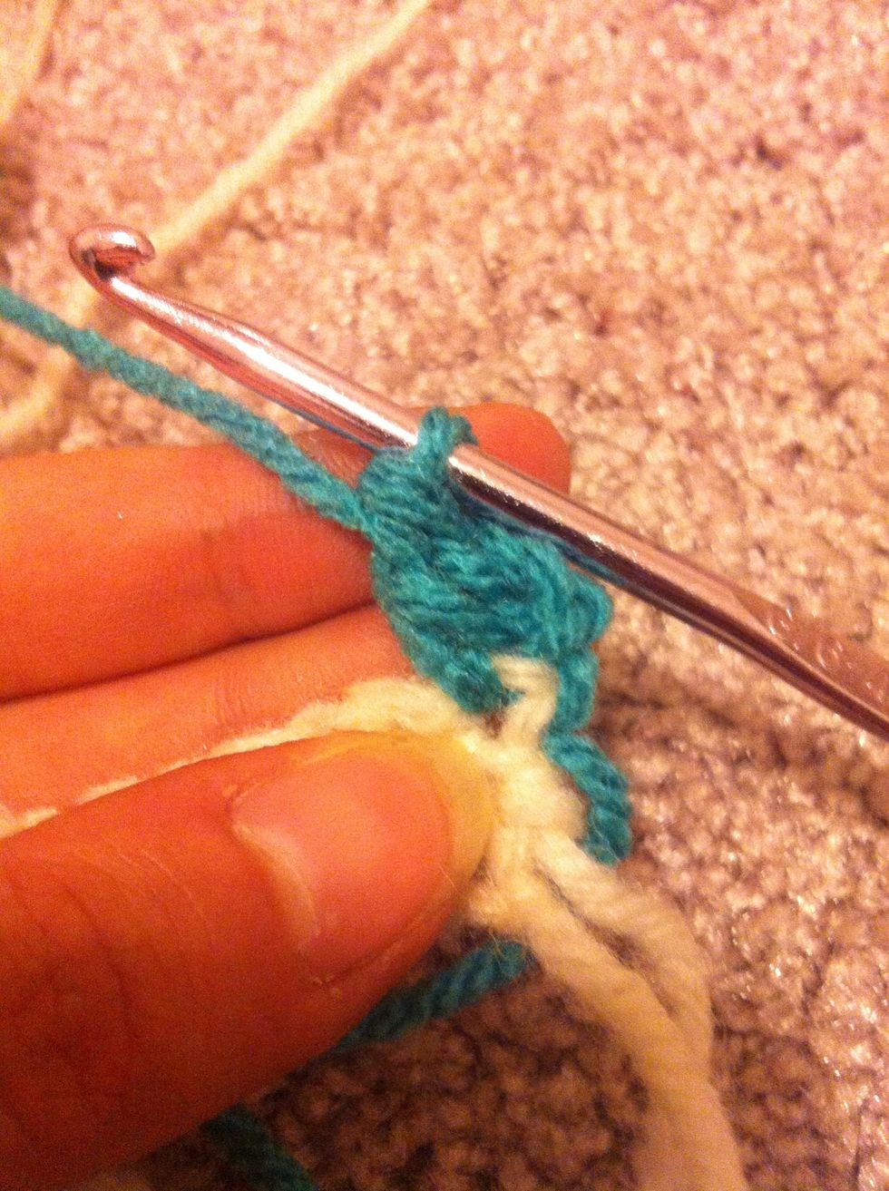 like this... now work 5 more double crochet in the next 5 stitches.