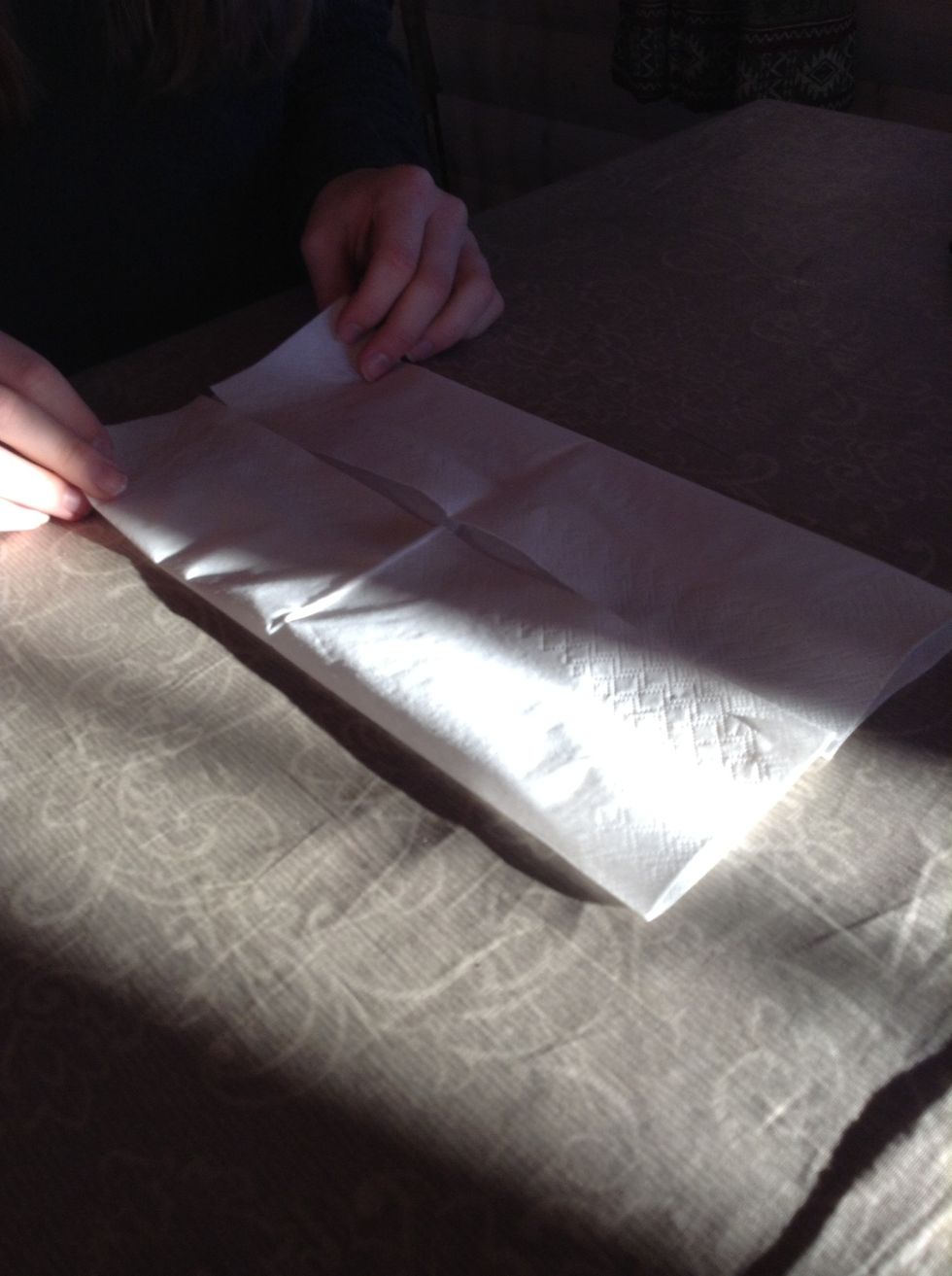Like this. Now you need to turn the napkin.