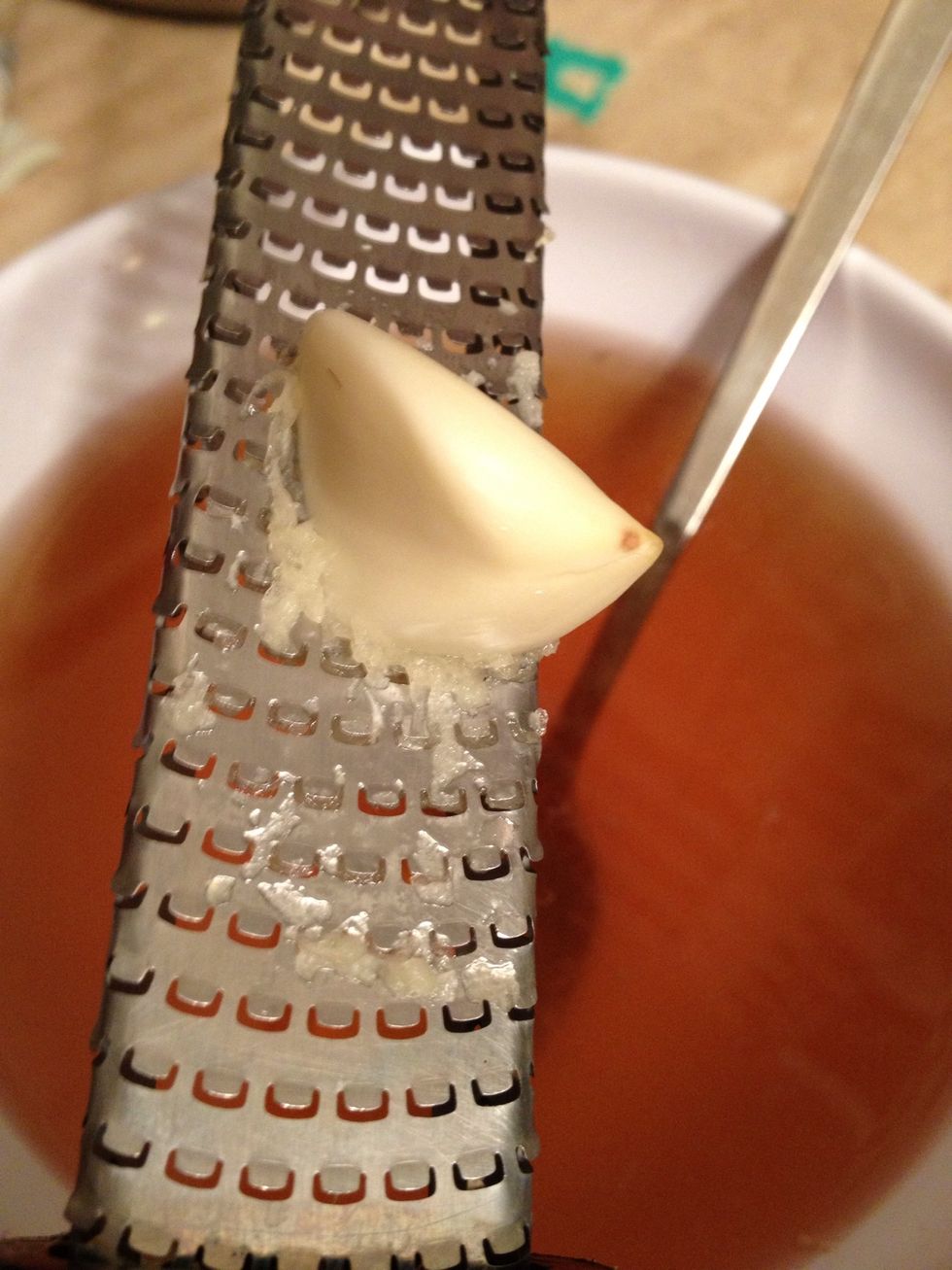Like this. This is a Microplane which grates super fine. Graters terrify me but I did ok.