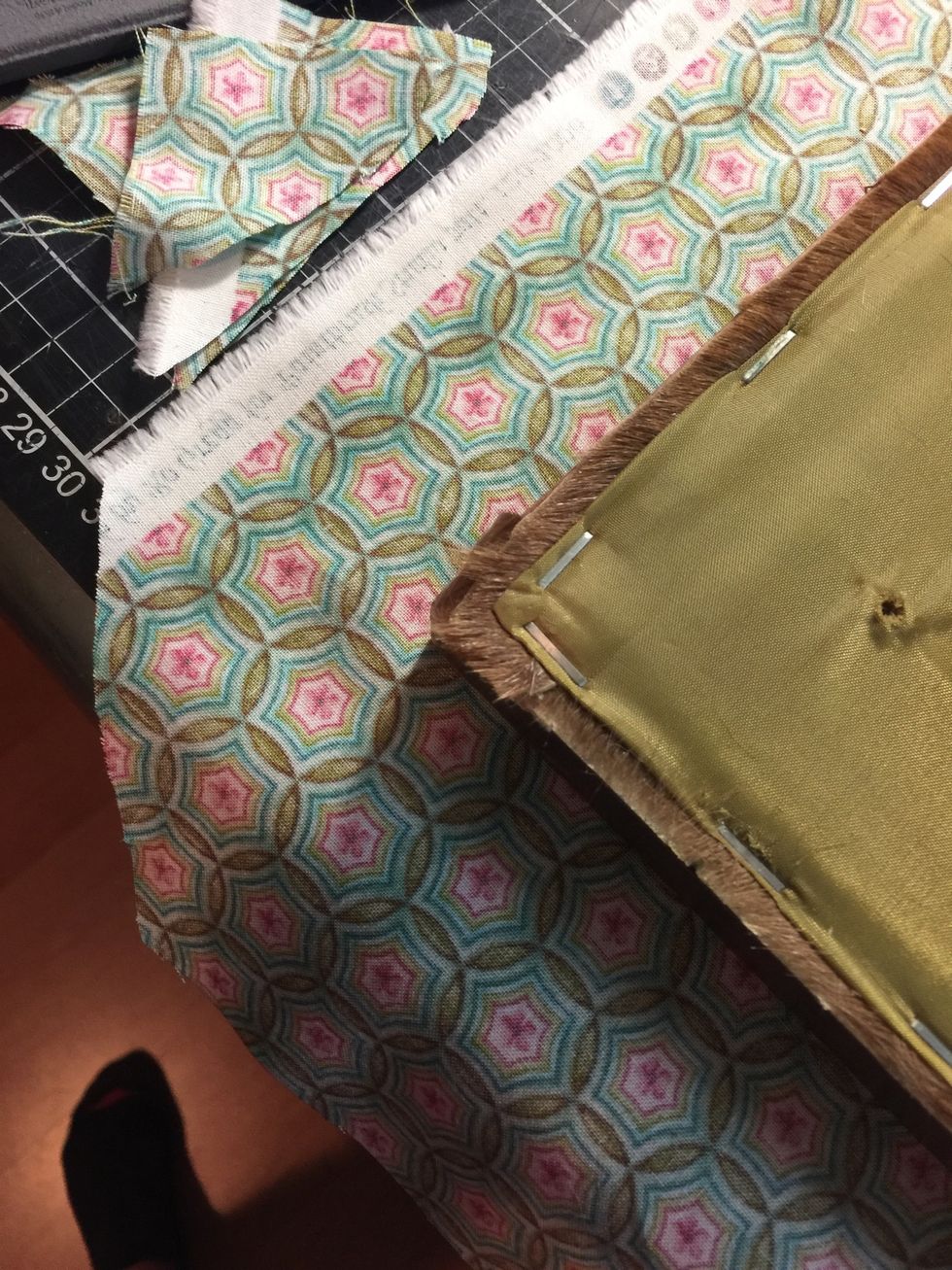 Like this to make it easier to staple the sides you can under double the fabric for a nicer look