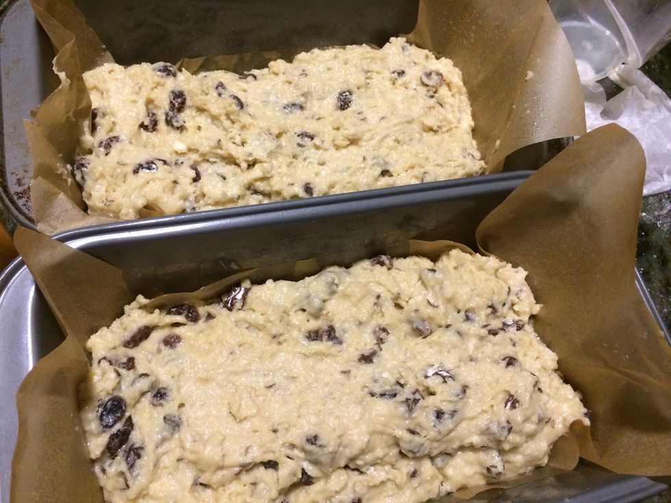Line 2 bread pans with parchment and spray with no-stick cooking spray. Pour mixture in pans evenly
