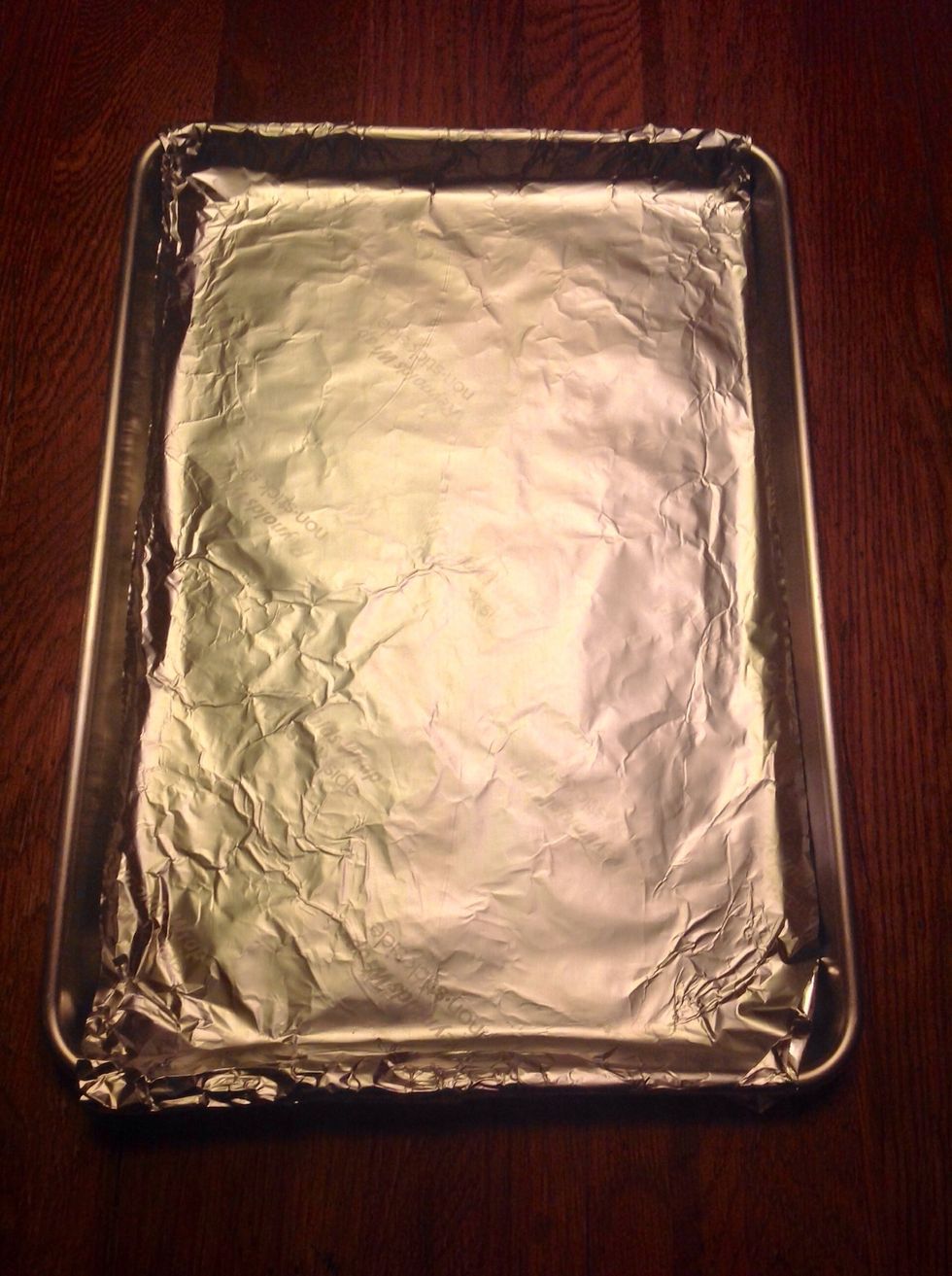 Line a baking pan with aluminum foil.