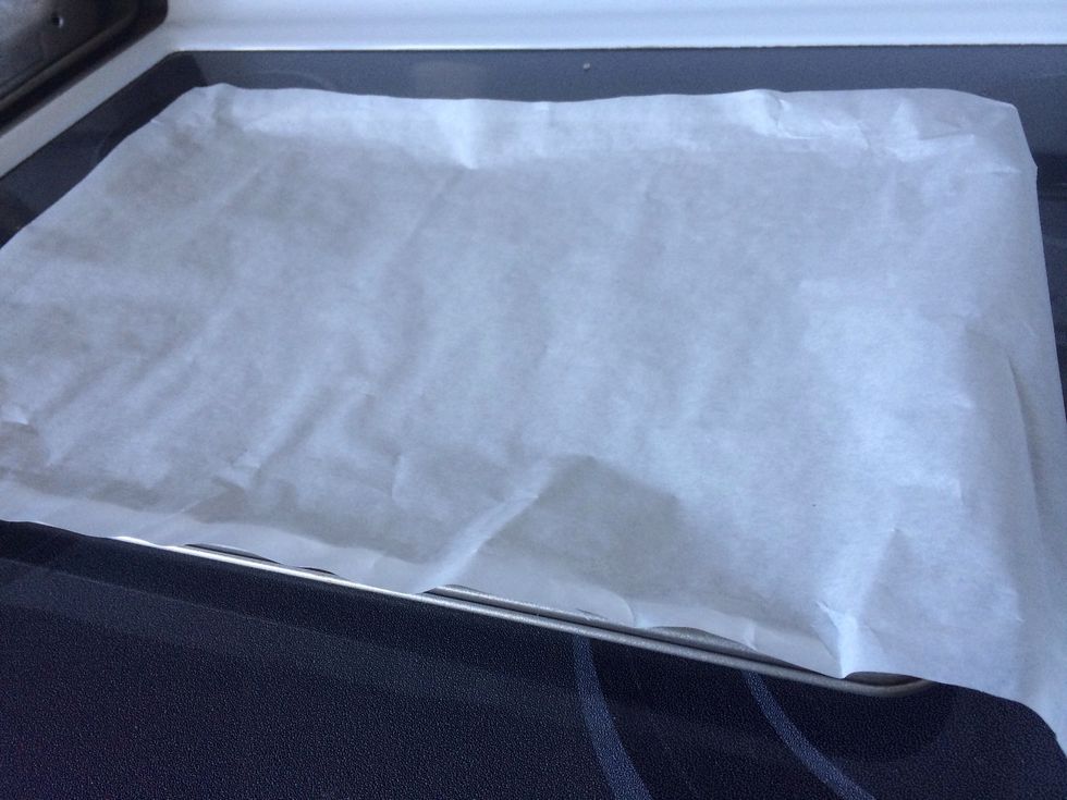 Line a cookie sheet with parchment paper (NOT wax paper).