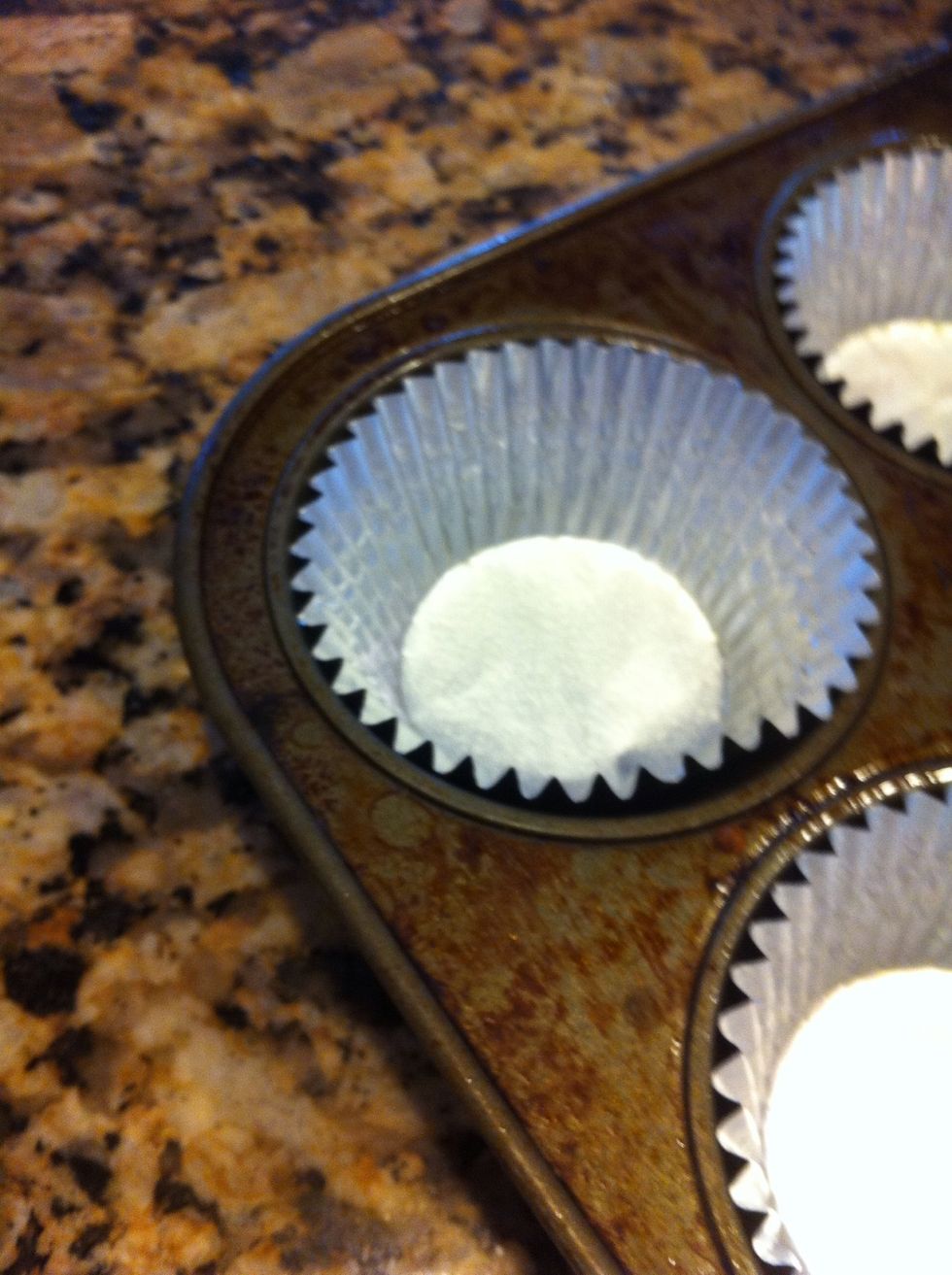 Line a cupcake pan with 12 liners and spray with non stick spray. Preheat oven to 350