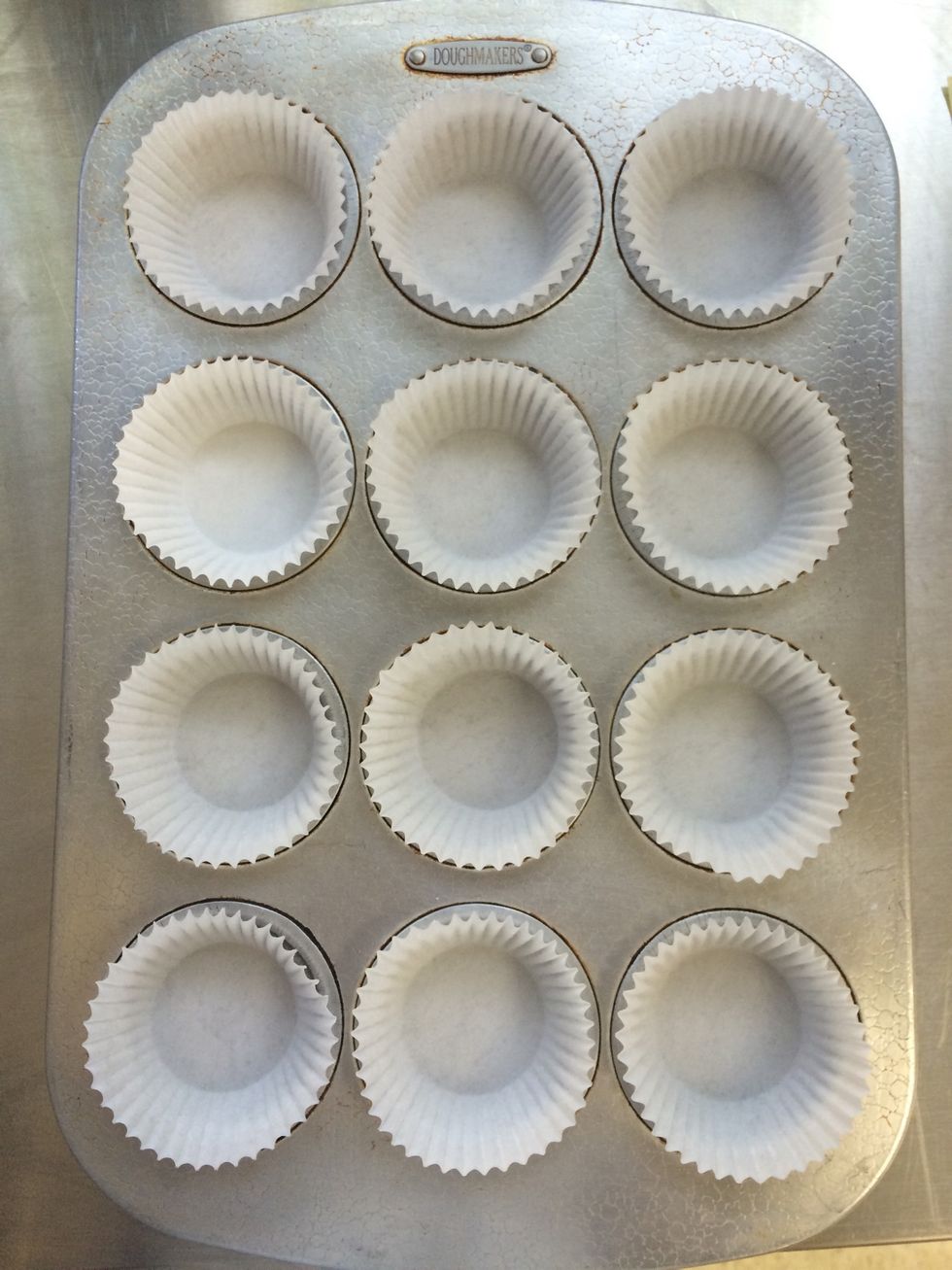 Line a cupcake pan with cupcake liners.