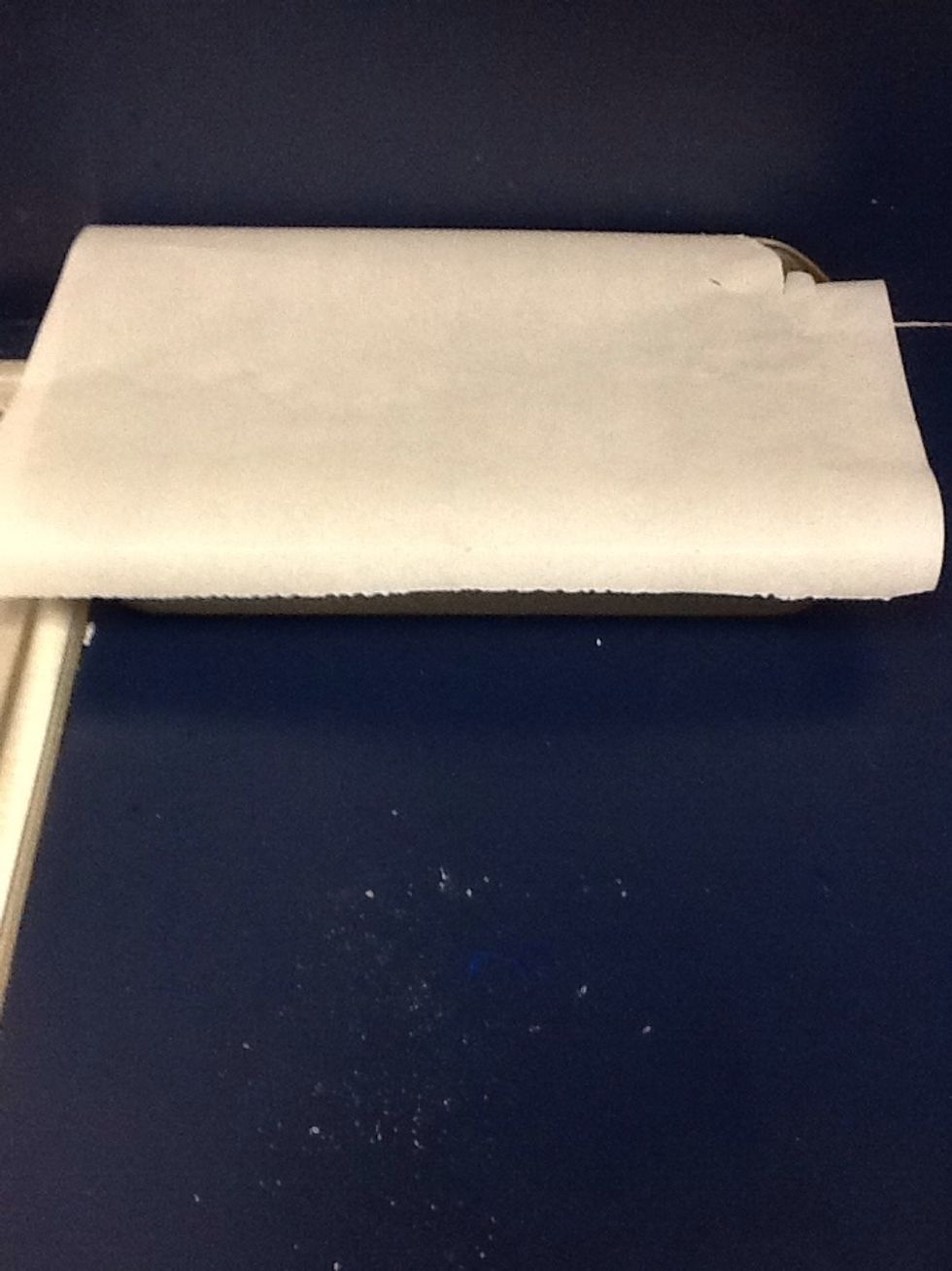 Line a pan with parchment paper.